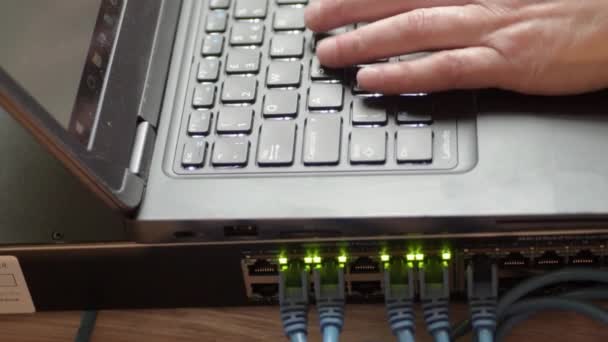 Network Engineer Working Ethernet Cable Switch — Vídeos de Stock