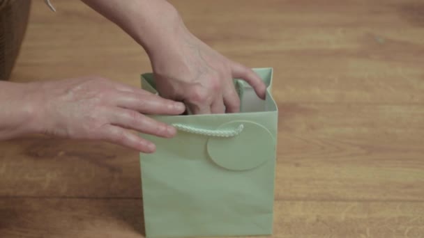 Woman Getting Bubble Bath Out Gift Bag — Vídeo de Stock