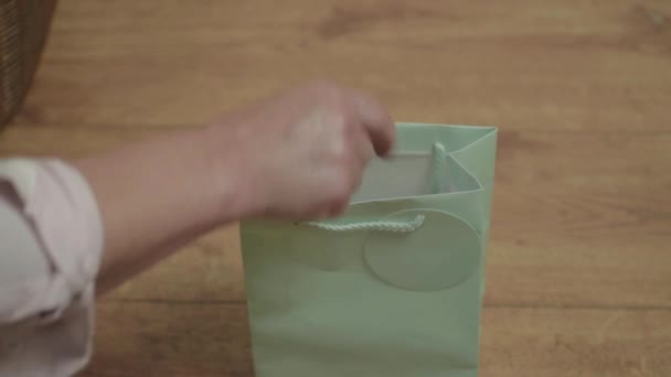 Woman Looking Gift Bag — Stock video