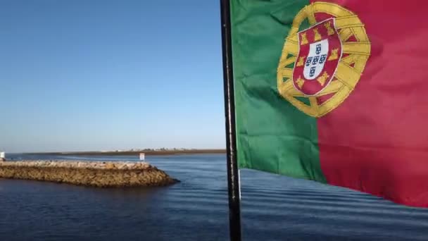 Portuguese Flag Waves Foreground Olhao Marina Background Portugal Extreme Close — стоковое видео