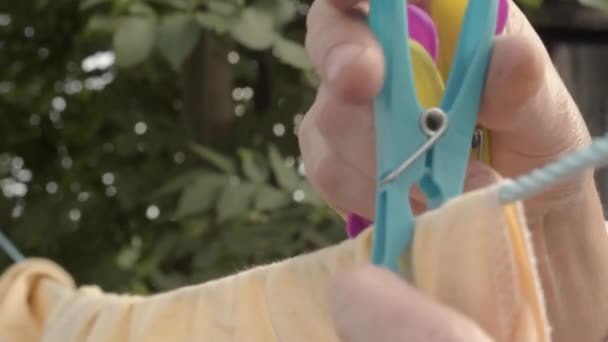 Woman Hanging Clothes Washing Line Pegs — Stok video