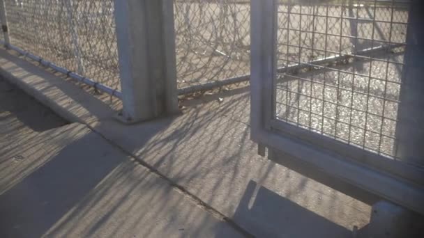 Prison Gate Closing Slow Motion Razor Wire — Stockvideo