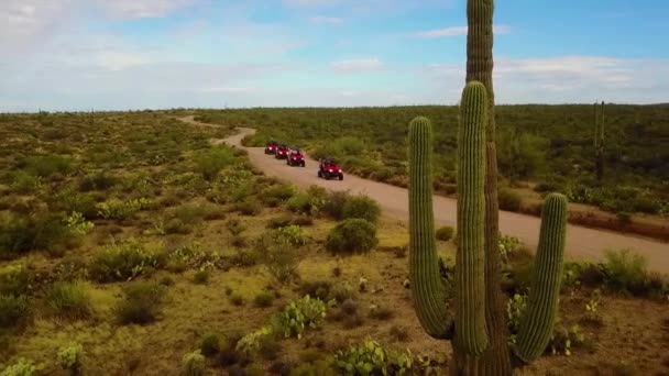 Aerial Drone Shot Pans Some Utv Cruising Arizona Desert Cloudy — Stockvideo