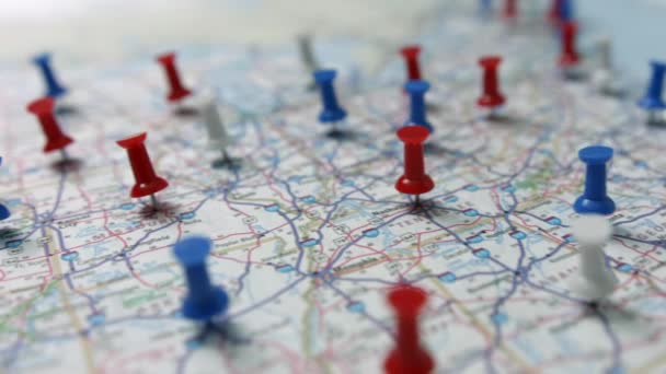 Camera Flight Revealing Red White Blue Pins Placed Marking Cities — 图库视频影像