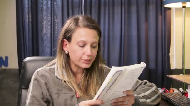 Woman Reading Book Explaining Something Camera Audience — Stockvideo