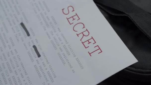 Black Gloved Hands Reading Top Secret Document Containing Classified Information — Stok video