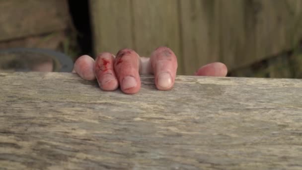 Exhausted Blood Stained Hand Struggling Get Grip — Stok video