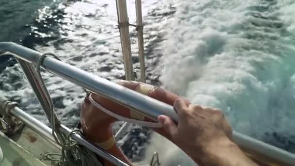 Hand Holding Rail Back Boat Ferry While Sailing Ocean — Vídeos de Stock