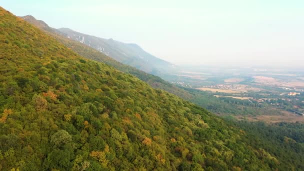 Aerial Pan Left Mountain Forest Turning Green Yellow Autumn — Stockvideo