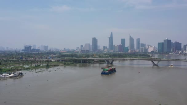 Aerial Slow Push Freighter Transporting Shipping Containers Saigon River Sunny — Vídeo de Stock