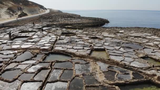 Aerial Drone Shot Flying Reverse Ancient Rocky Salt Pans Gozo — Stock videók