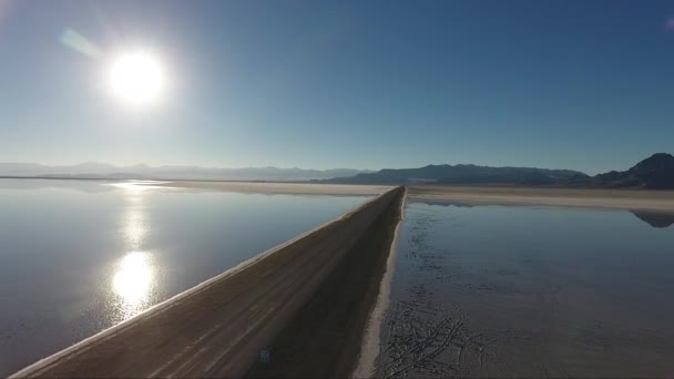 Drone Shot Flying Bonneville Salt Flats Shows Salt Flats Causeway — Stock Video