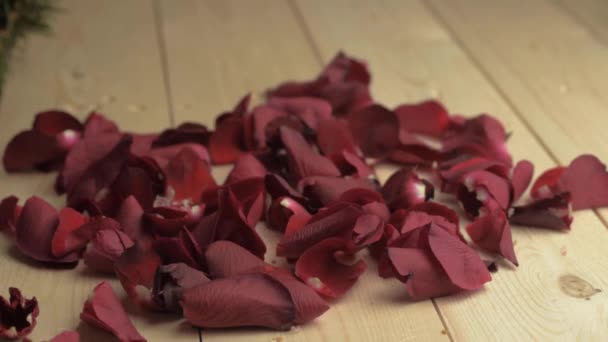 Red Rose Flower Petals Falling Wooden Floor — стоковое видео