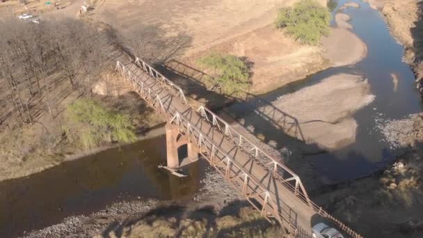 Aerial Shot Pickup Truck Crossing Old Steel Bridge — ストック動画