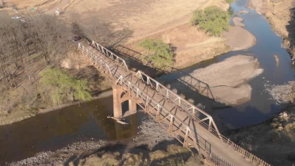 Aerial Locked Shot Car Crossing Old Steel Bridge — Αρχείο Βίντεο