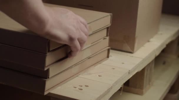 Hand Moving Cardboard Boxes Wooden Pallet — Vídeo de Stock