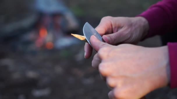 Young Woman Shapes Stick Point Knife Outdoor Setting Slow Motion — Vídeos de Stock