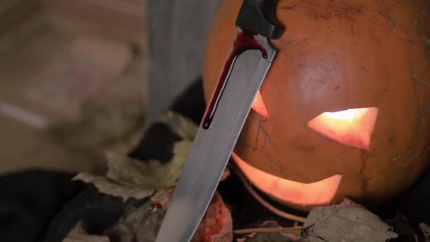 Creepy Halloween Carved Pumpkin Knife Dripping Blood — Vídeo de stock