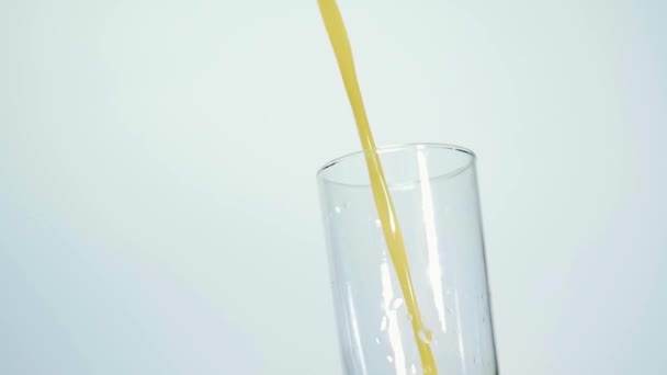 Slow Motion Shot Fresh Orange Juice Being Poured Glass White — Vídeo de Stock