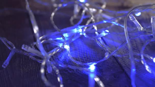 Kerst Achtergrond Met Blauwe Knipperende Decoratieve Lichten — Stockvideo