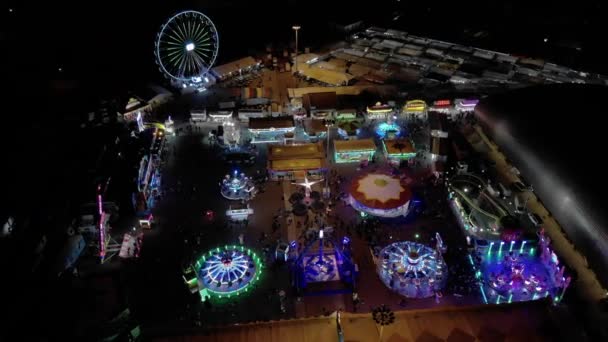 Colorful Fun Amusement Park Night People Having Fun Aerial Shot — Stock Video