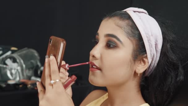 Close Young Beautiful Woman Looking Mobile Fixing Her Lipstick Red — Wideo stockowe