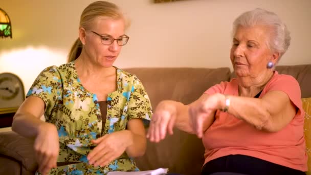Front View Closeup Home Healthcare Nurse Helping Elderly Woman Hand — Wideo stockowe