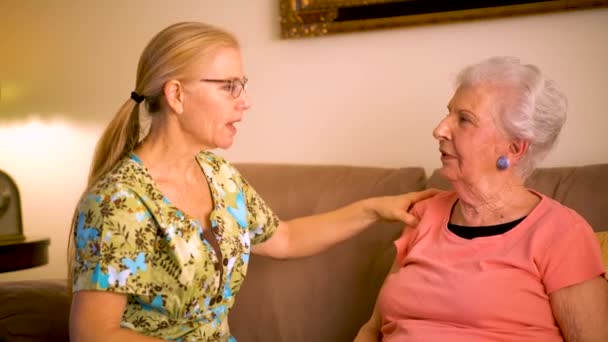 Closeup Home Healthcare Nurse Helping Massage Elderly Woman Shoulder — Video