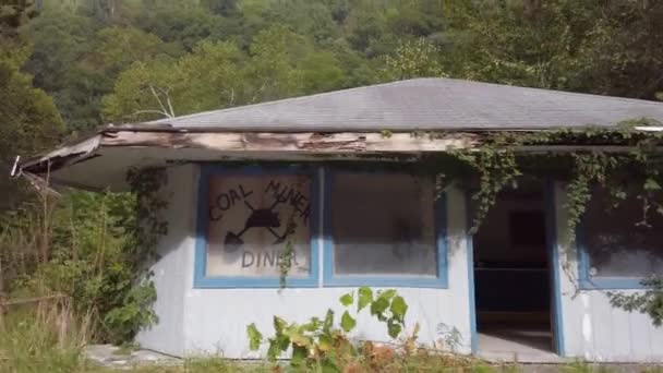 Camera Moves Derelict Abandoned Diner Weeds Growing Hollows West Virginia — kuvapankkivideo