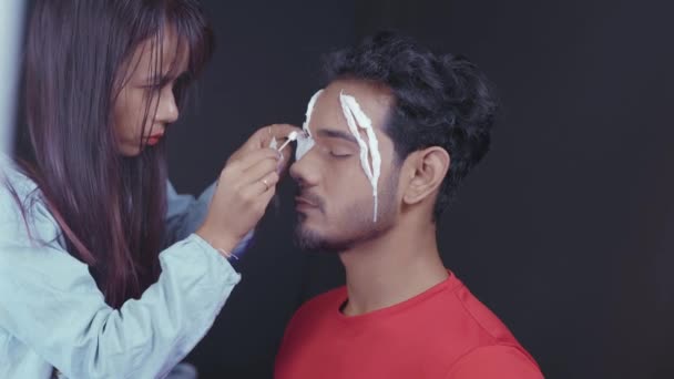 Professional Make Artist Putting White Prosthetic Insert Man Face Make — 图库视频影像