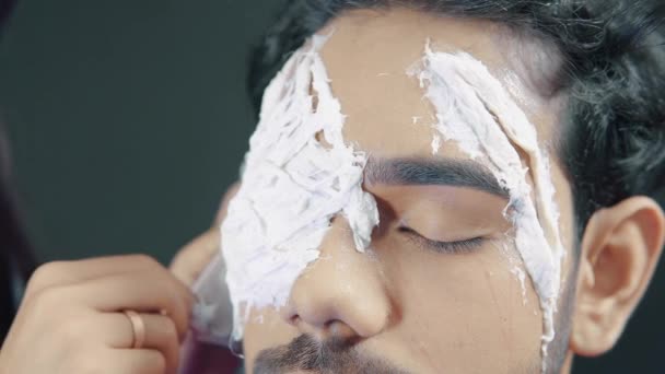 Make Artist Applying White Prosthetic Insert Man Face Make Halloween — Stockvideo