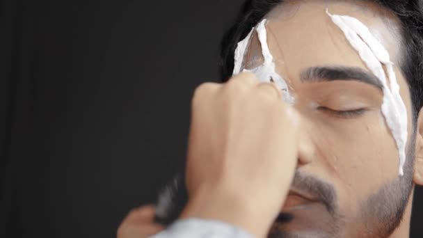 Make Artist Applying White Prosthetic Insert Man Face Make Halloween — Vídeos de Stock