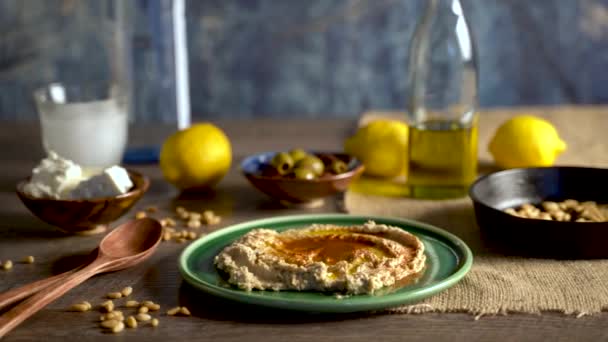 Warm Low Angle Slide Right Showing Middle Eastern Food Spread — Stockvideo