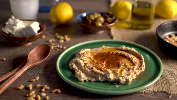 Warm Low Angle Slide Right Showing Mediterranean Food Spread Olives — Stockvideo