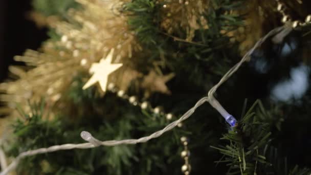 Christmas Tree Gold Tinsel Decorations — Vídeo de Stock