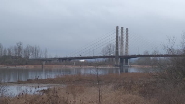Cars Trucks Driving Bridge Cloudy Day Blue River Flows Slow — Stockvideo