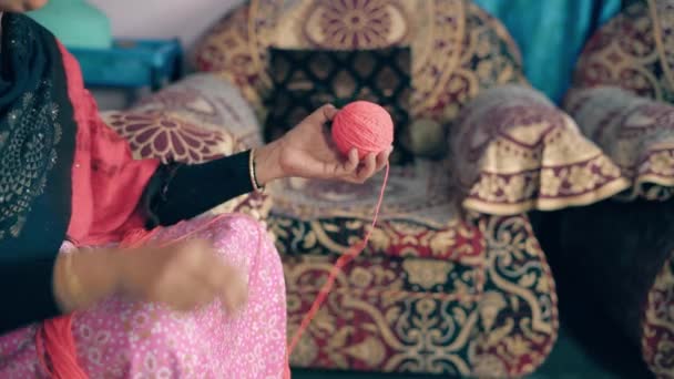 Traditional Indian Woman Roll Red Thread Ball Preparing Knitting — 비디오