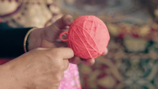 Close Woman Hands Rolling Slowly Red Wool Ball — 图库视频影像