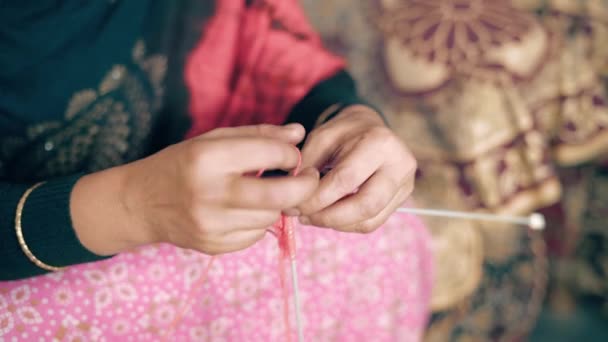 Close Indian Woman Hands Knits Craft Needles Red Wool Footage — Stockvideo