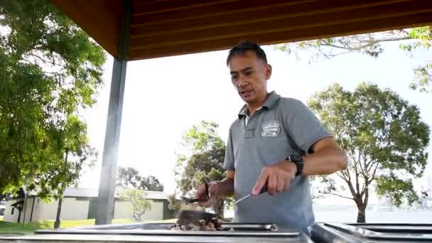 Man Cooks Steaming Vegan Food Outdoor Hot Plate Slow Motion — Stock videók