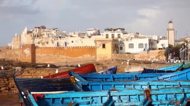Camera Panning Fishing Boats Seaside Essaouira Morocco Crenelated Wall Sunny — Video