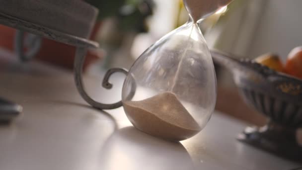 Hourglass Sand Falling Slow Motion Paning — Stockvideo
