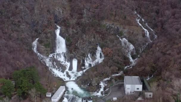 Aerial Multiple Waterfalls Coming Out Rocky Hillside Joining Streams Fly — Vídeo de stock