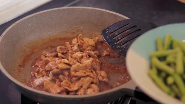 Sauteing Pork Meat Beans Frying Pan Black Flat Holed Ladle — Video