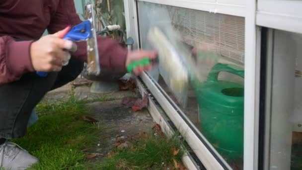 Female Cleaning Window Home Sweden Close — Stockvideo