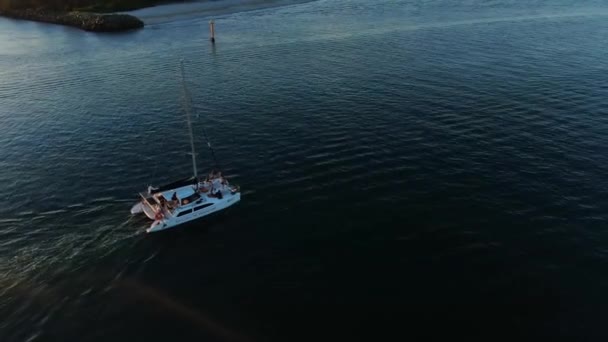 Drone Orbiting Catamaran Motoring Sunset Peaceful Calm Day — Vídeos de Stock