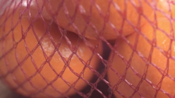 Группа Свежих Апельсинов Сетчатой Сумке — стоковое видео