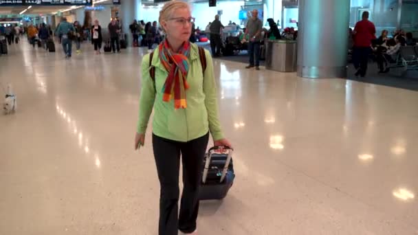 Front Shot Woman Pulling Carry Luggage Airport — Stock Video