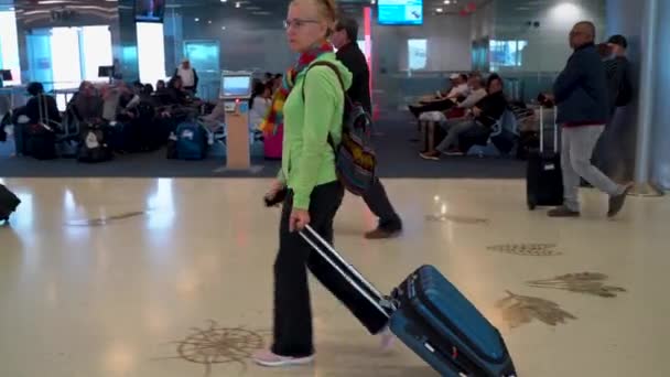 Side Shot Mature Woman Walking Airport Her Carry Luggage — Stockvideo