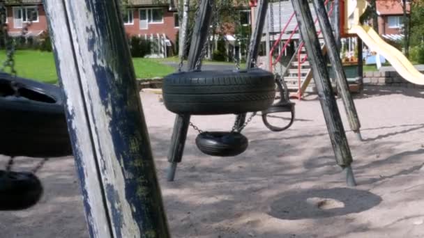 Close Empty Swing Made Used Car Tires Swinging Playground Town — Video